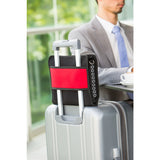 The Airpocket has a wide band on the back that slips over the extended handle of your suitcase