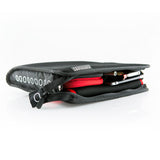Side view of Airpocket packed with travel accessories